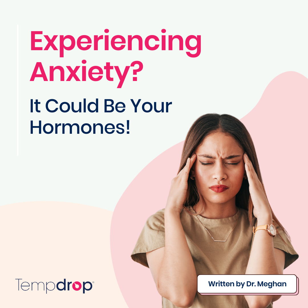 A woman with her hands on her head, looking overwhelmed and stressed